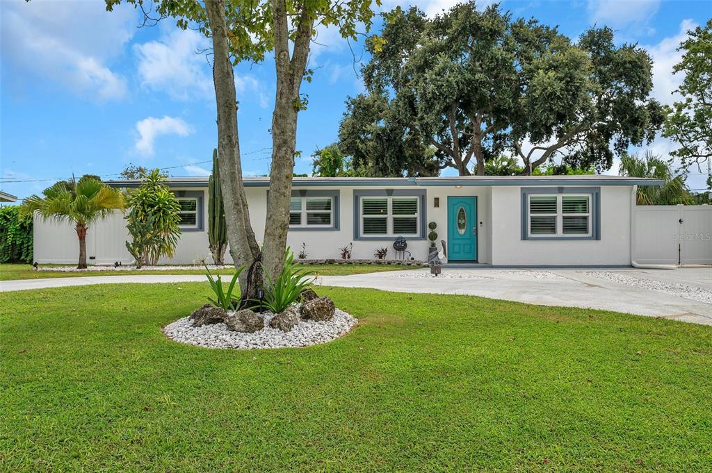 a house view with a garden space