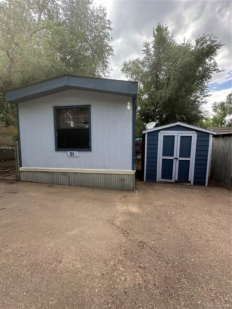 a view of a house with a garage