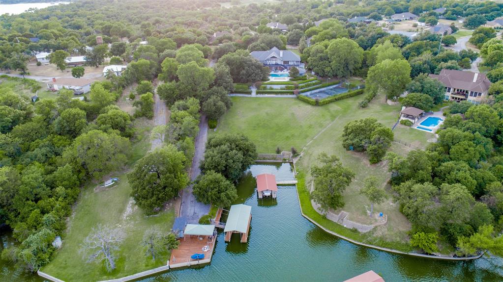 an aerial view of residential house with outdoor space and swimming pool