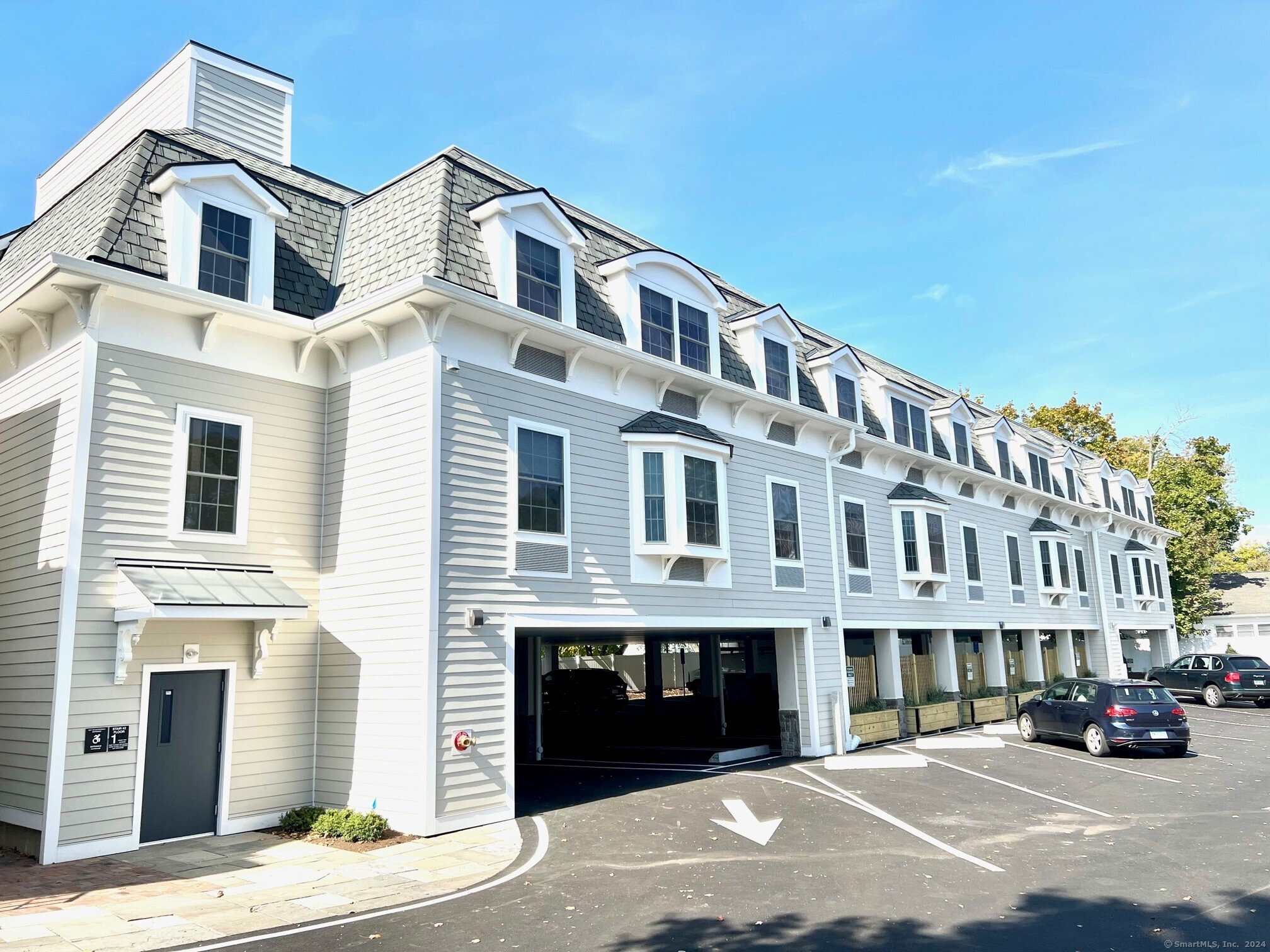 a front view of a building with street view