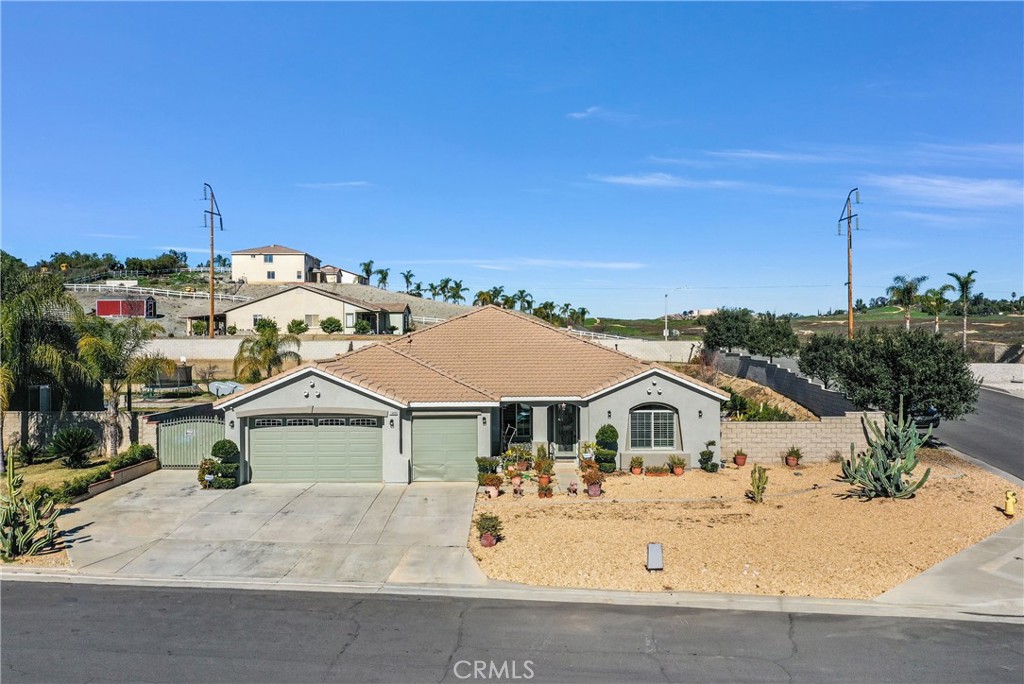 an aerial view of a house with a garden