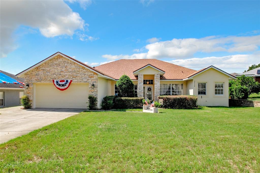 a view of a house with a big yard