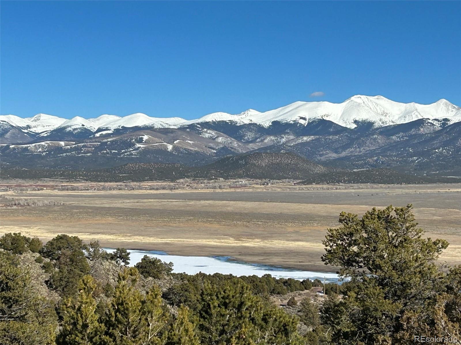 a view of ocean with mountains