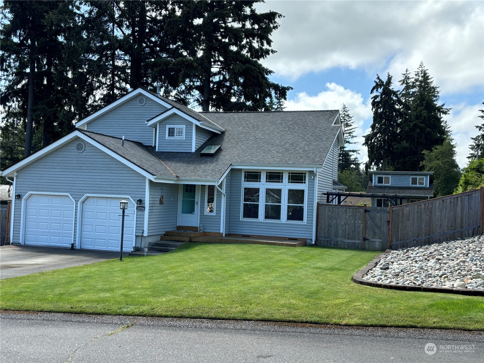 a house view with a garden space