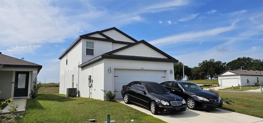 a car parked in front of a house