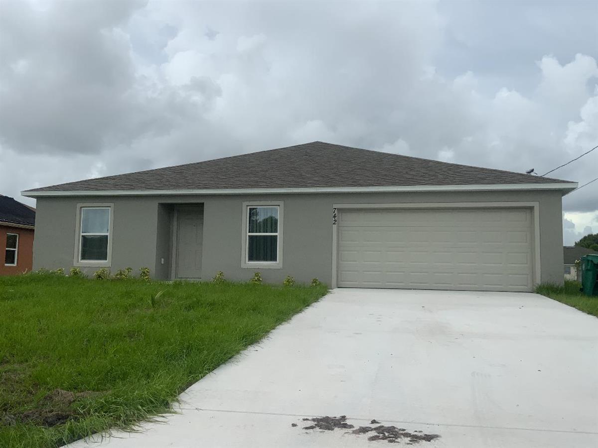 front view of house with a yard