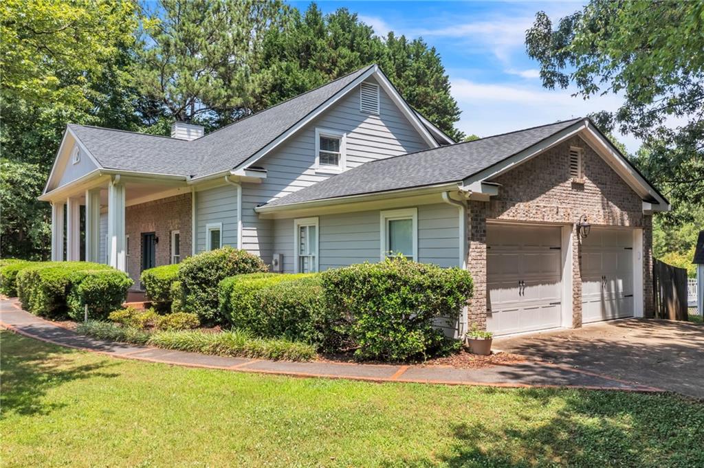 front view of a house with a yard