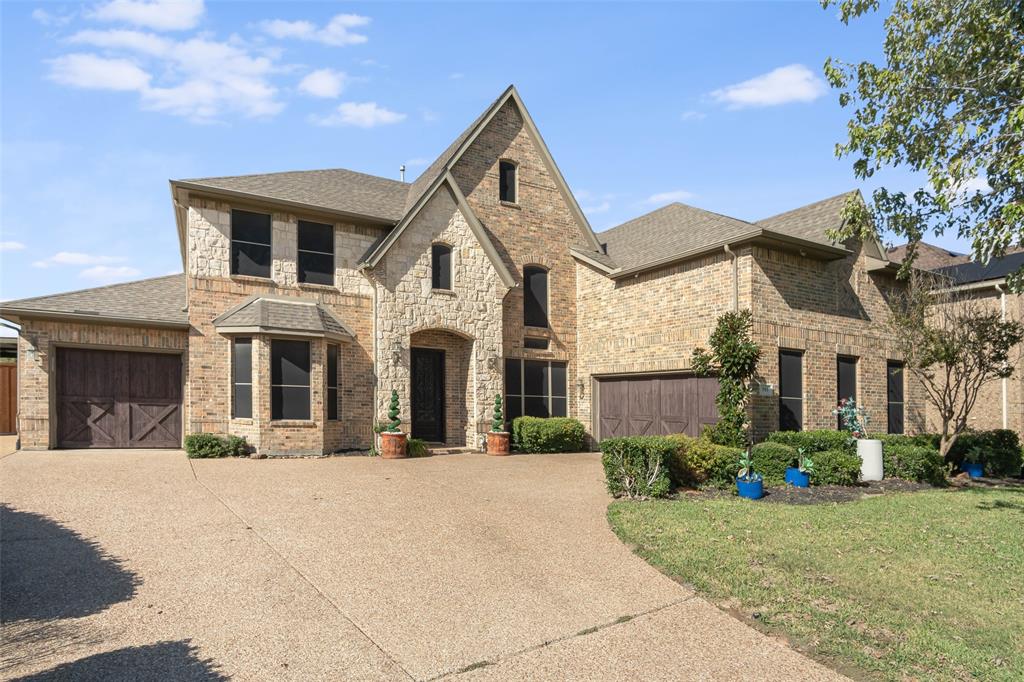 View of front of property with a front yard