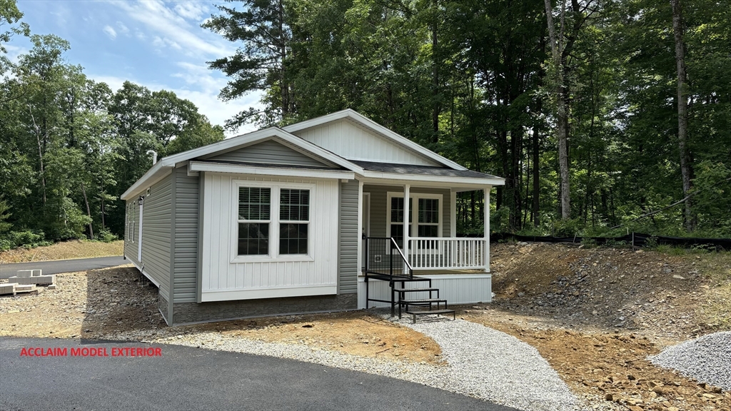 a house with trees in the background