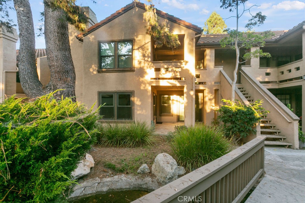 a front view of a house having yard