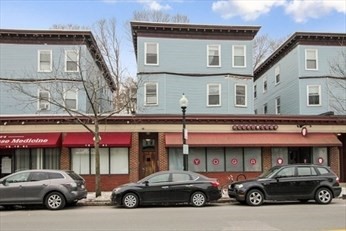 a car parked in front of a building