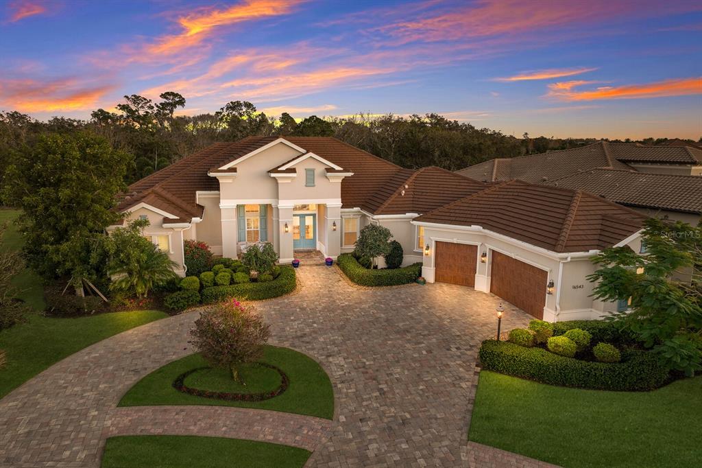 a view of a house with a yard