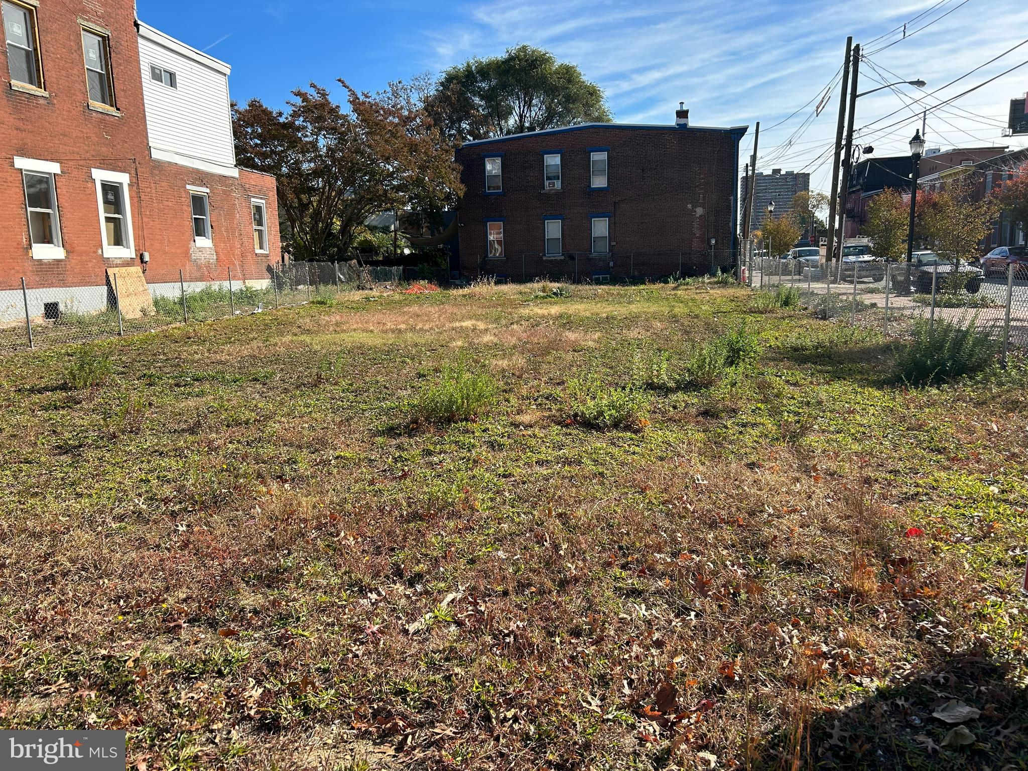 a yard that is sitting in front of a house