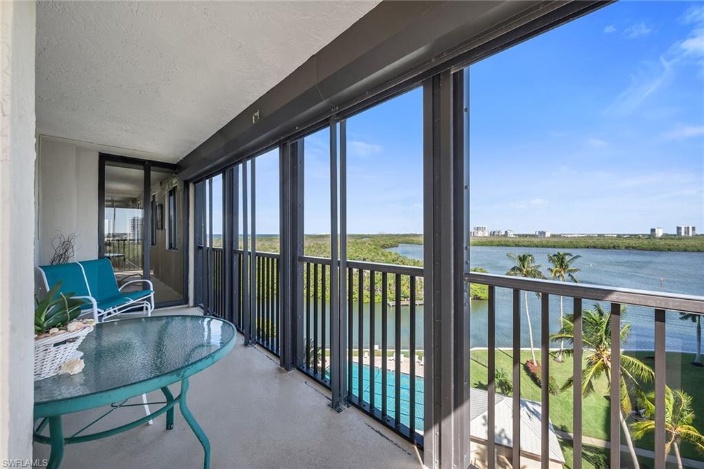 a view of balcony with furniture