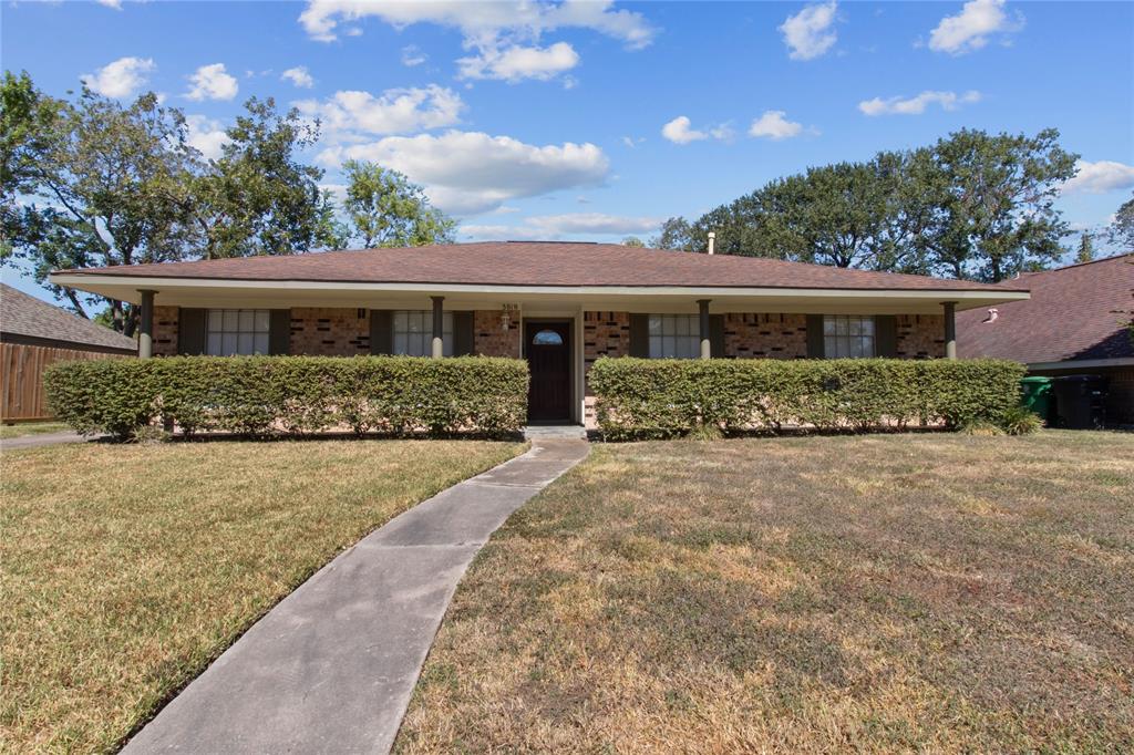 front view of house with a yard