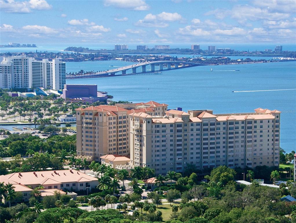 a view of a city with tall buildings