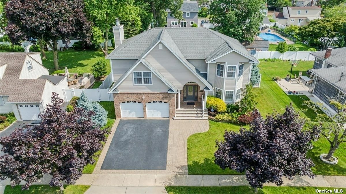 a aerial view of a house with garden