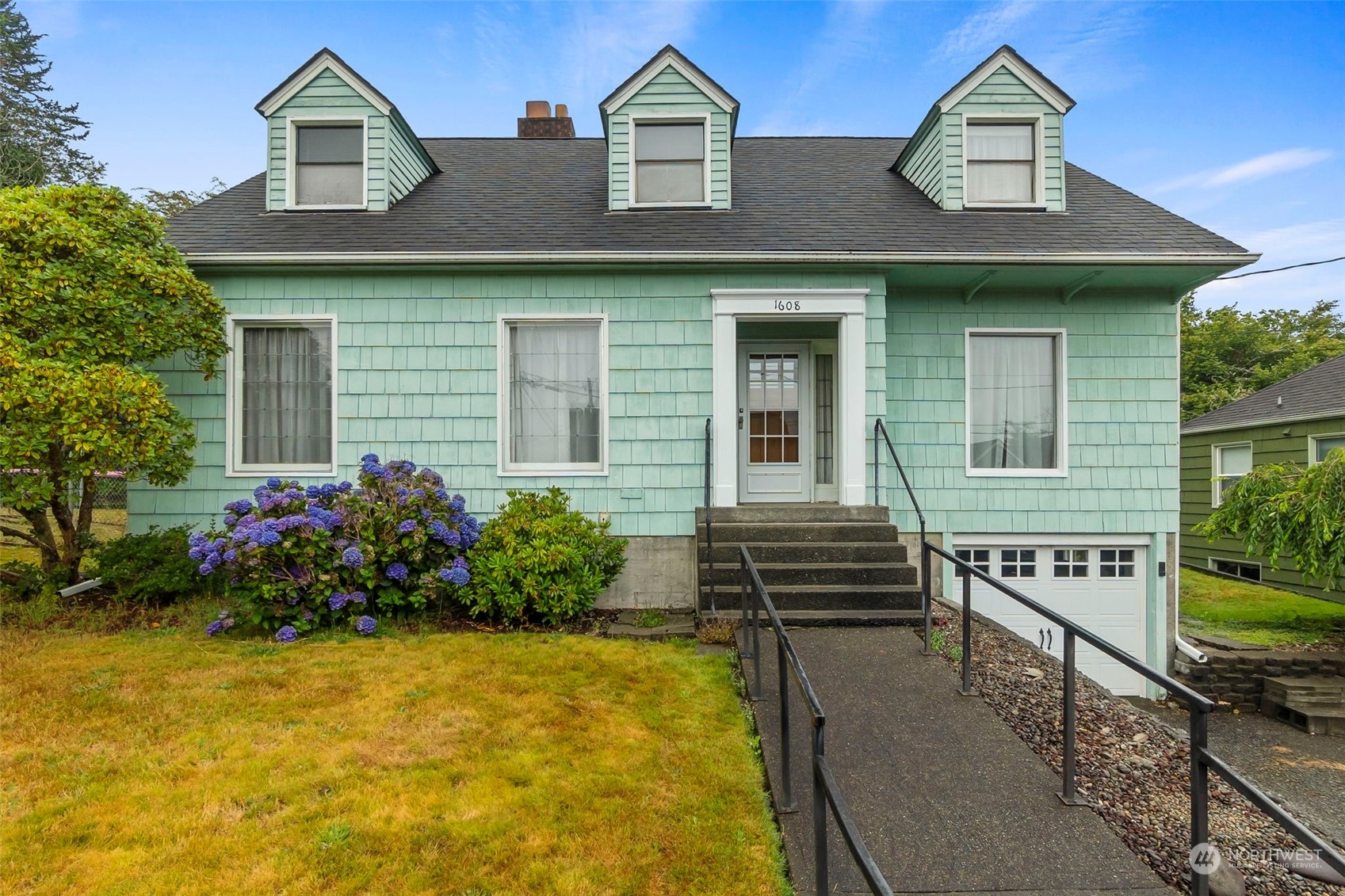 front view of house with a yard