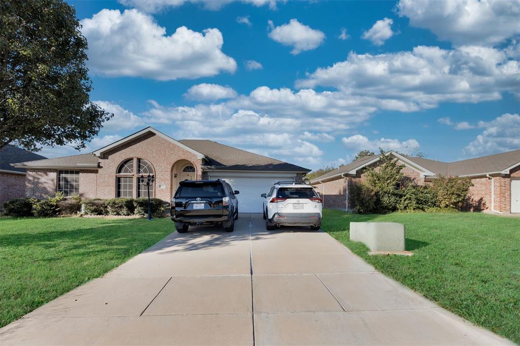 a view of a house with a back yard