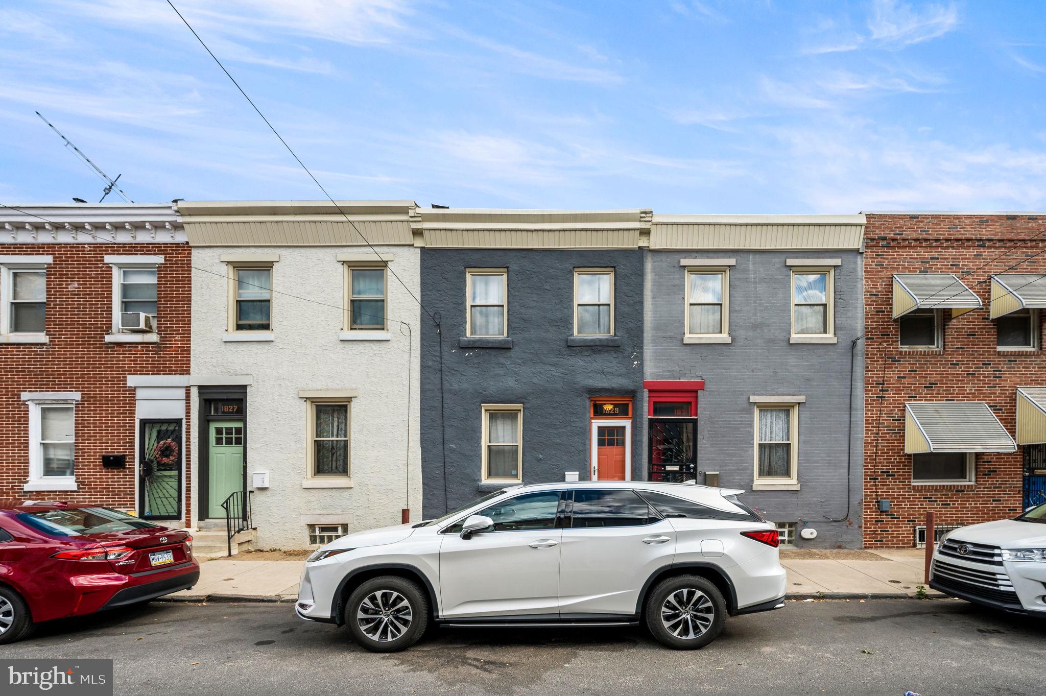 a car parked in front of a building