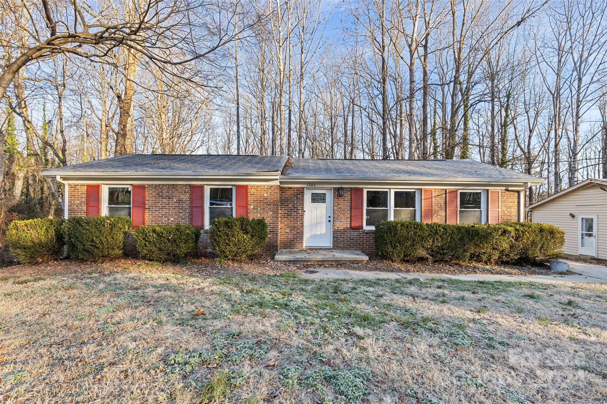 front view of a house with a yard