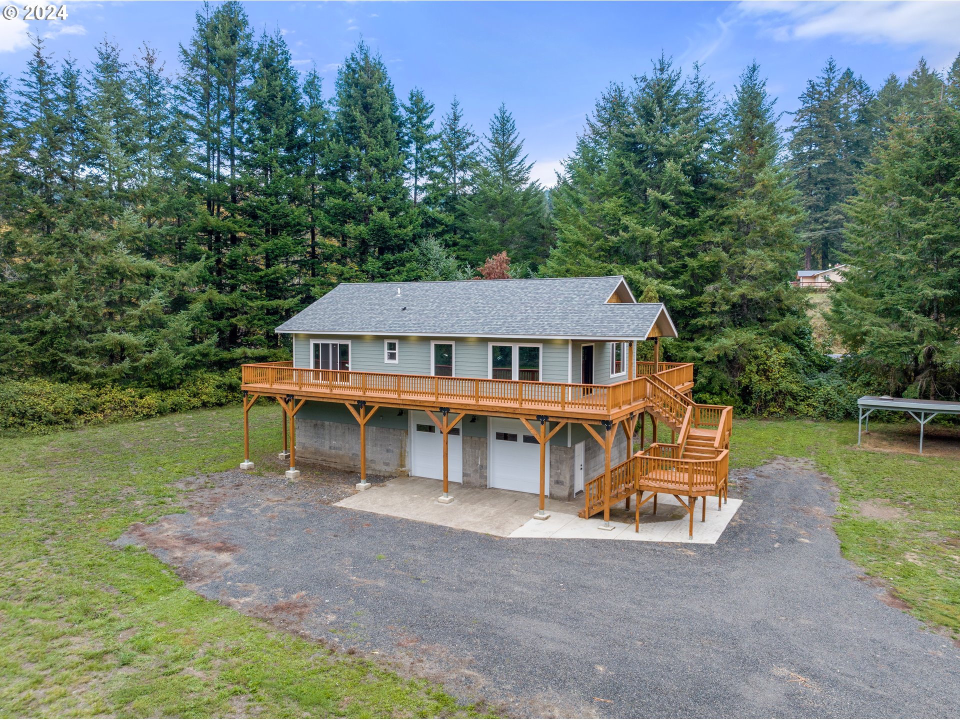 aerial view of a house with garden