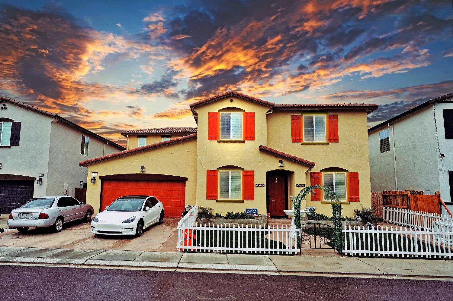 front view of a house with a balcony