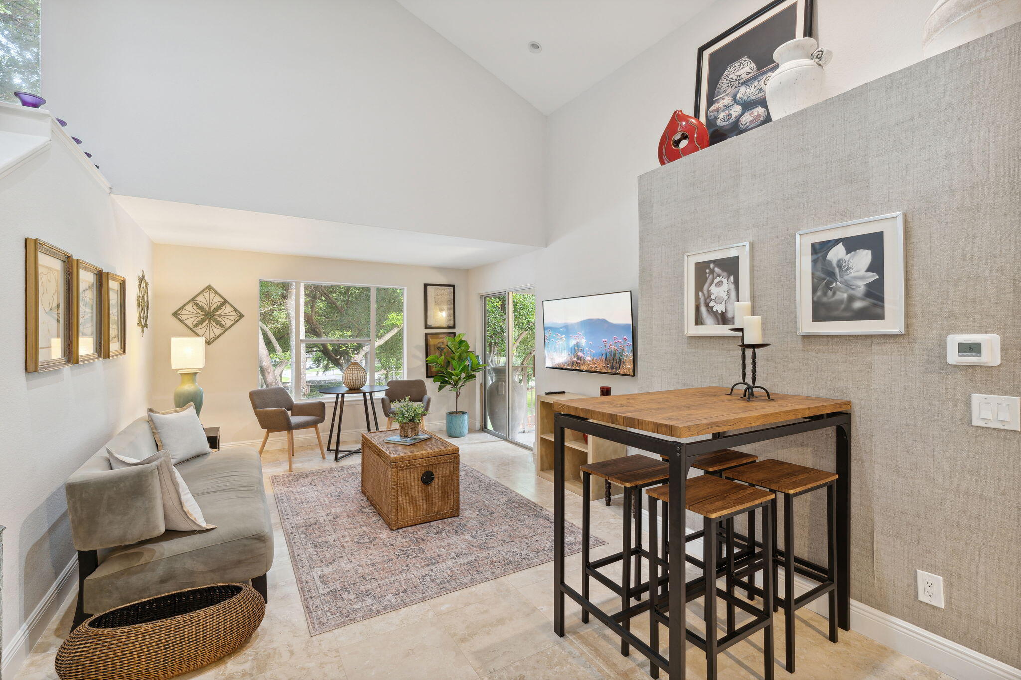 a view of a livingroom with furniture and a table