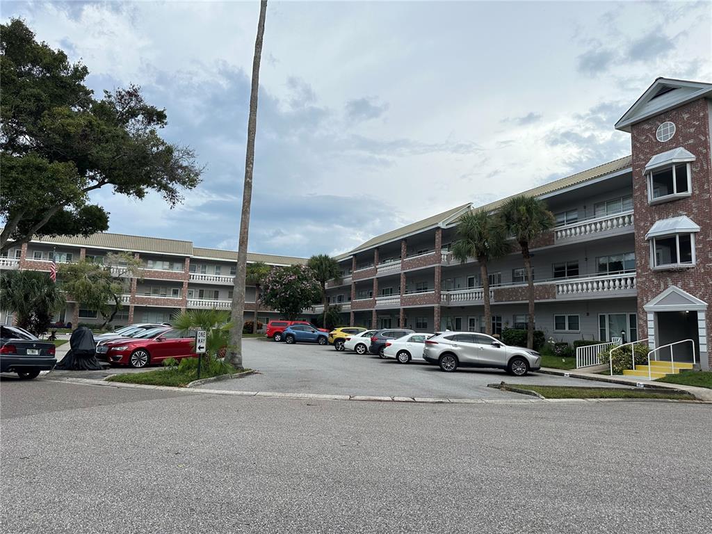 a cars parked in front of a building