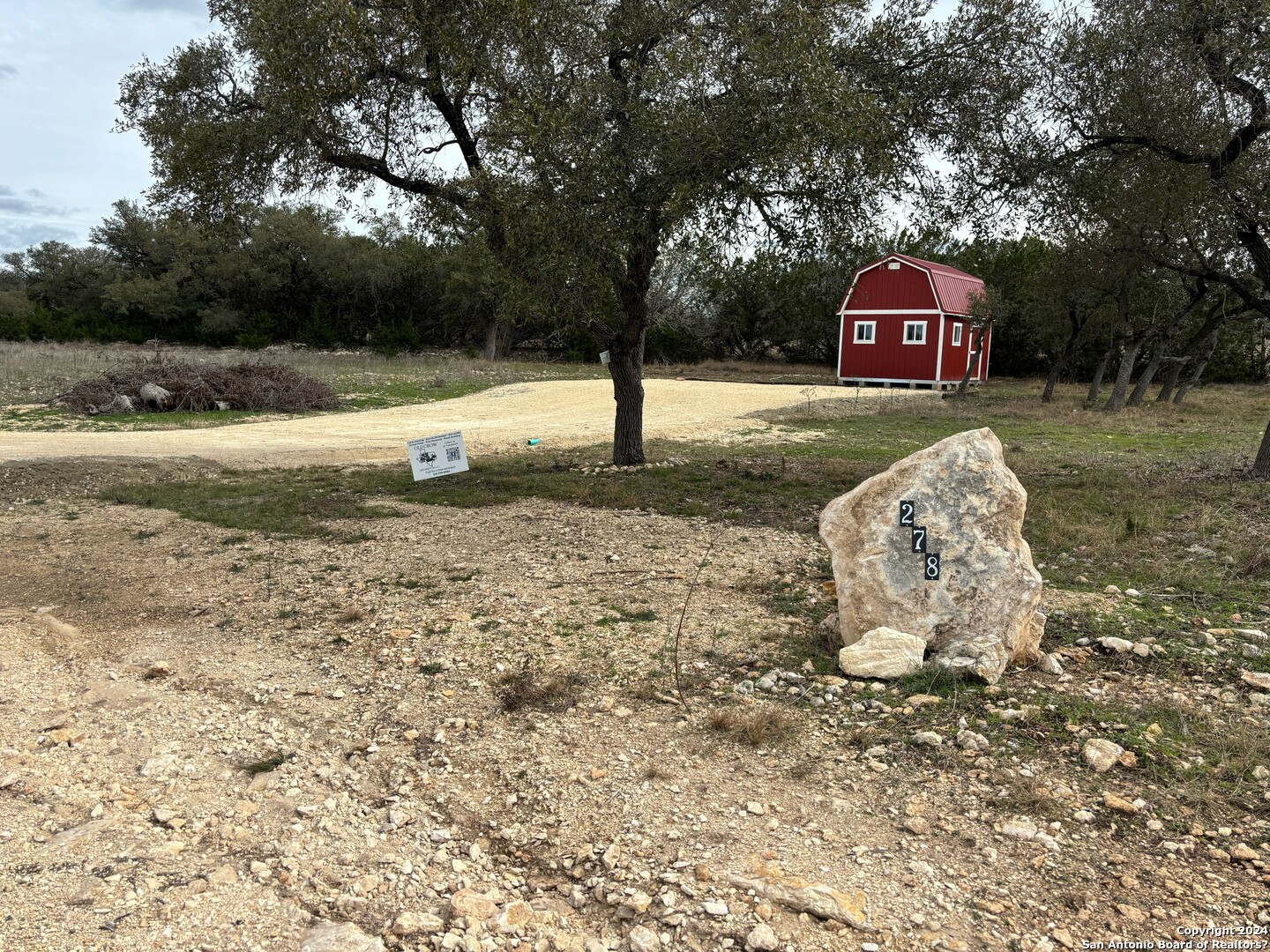 a fire hydrant in the middle of a field