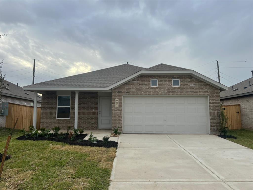 a front view of house with yard