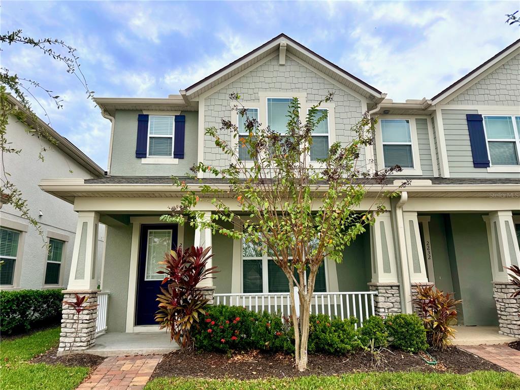 front view of a house with a small yard