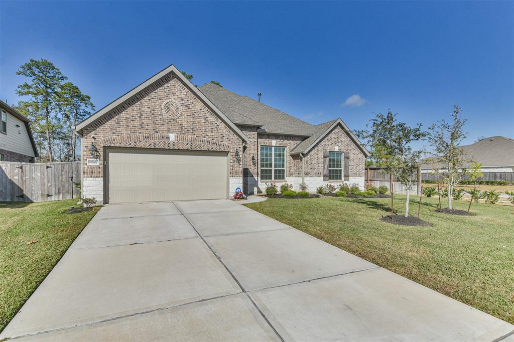 Welcome Home To This Stunning 1-Story featuring a beautifully manicured, lush upgraded landscaping.