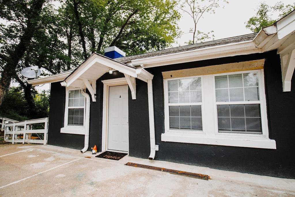 a front view of a house with a garage