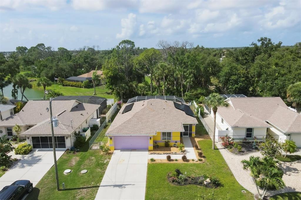 an aerial view of a house with a garden