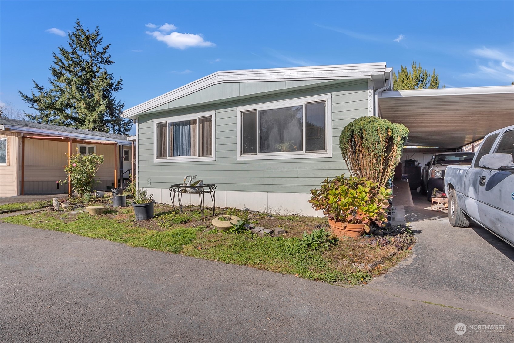 a front view of a house with patio