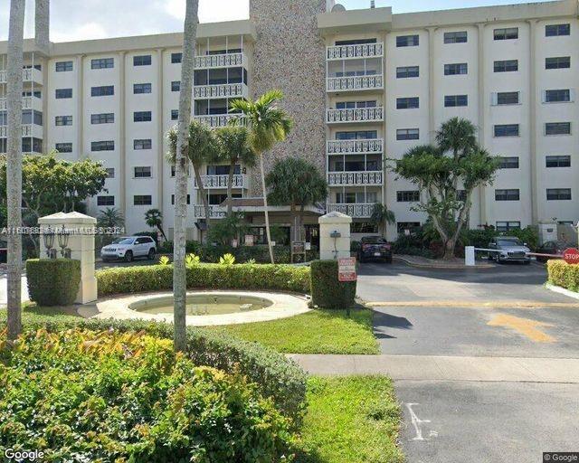 a view of a building with garden