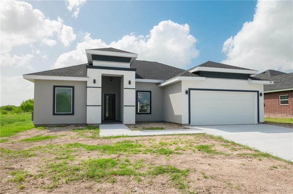 a view of an house with backyard space