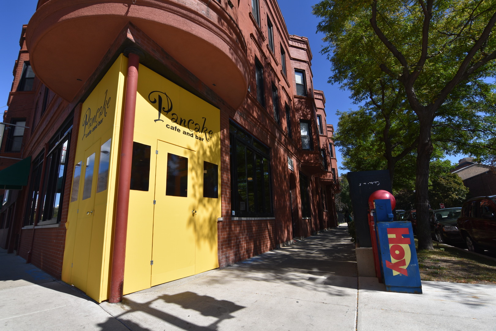 a front view of a building with street view