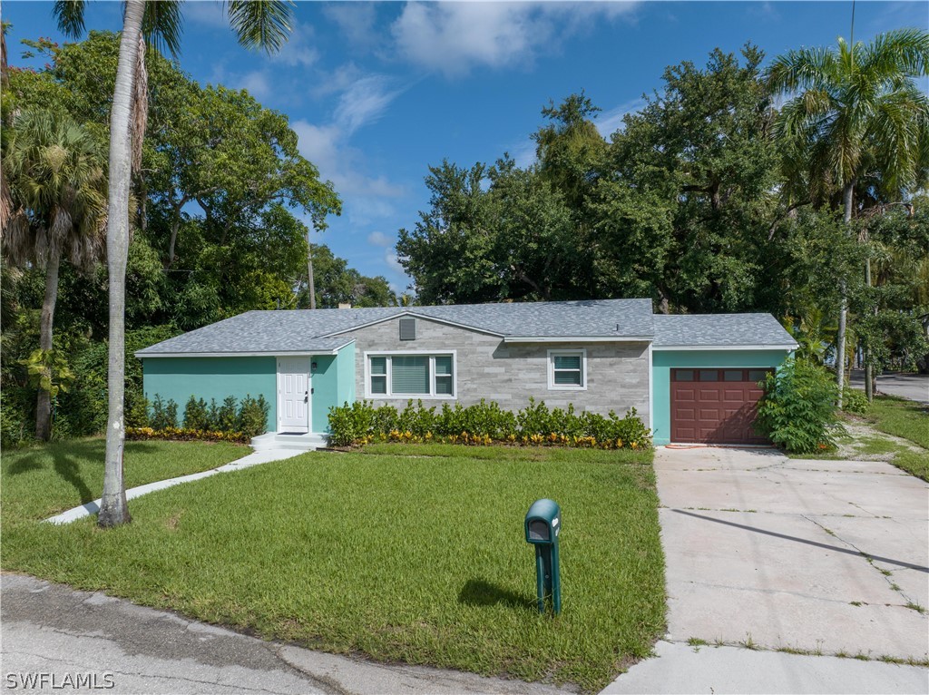 front view of a house with a yard