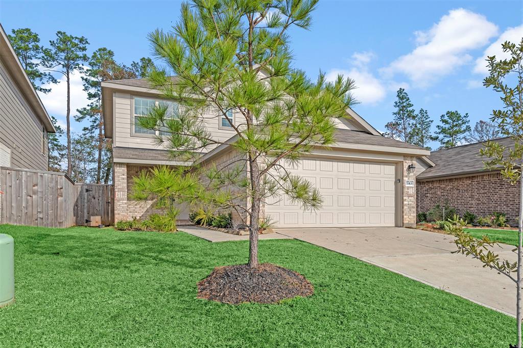 a house view with a garden space