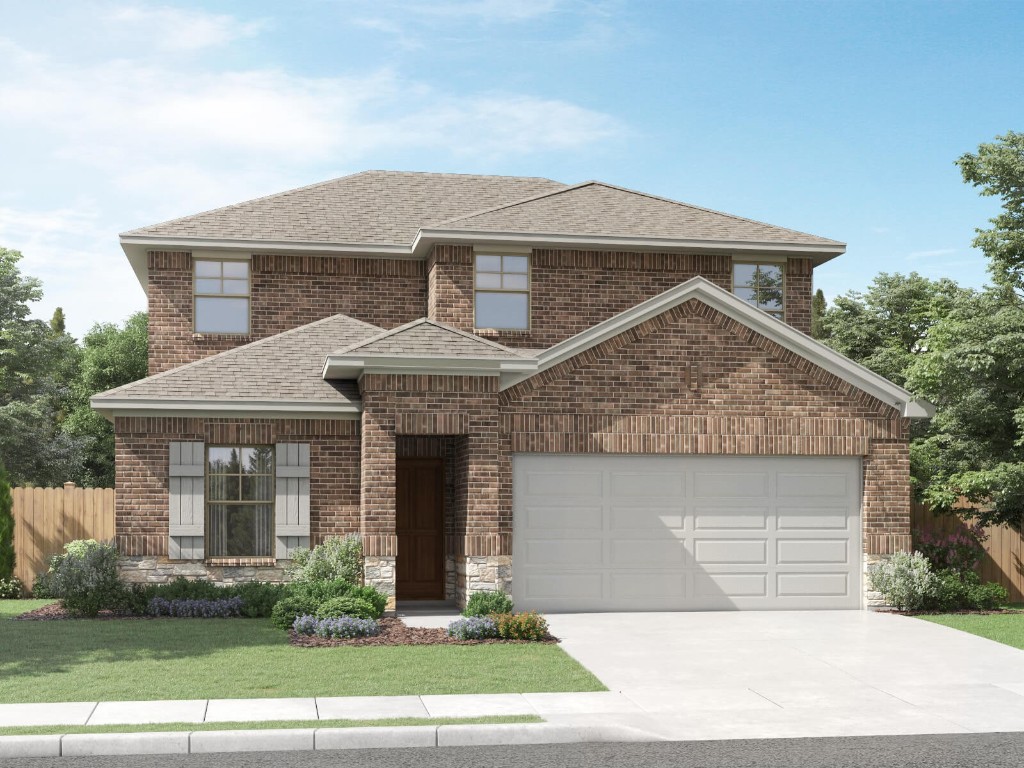 a front view of a house with a yard garage and outdoor seating