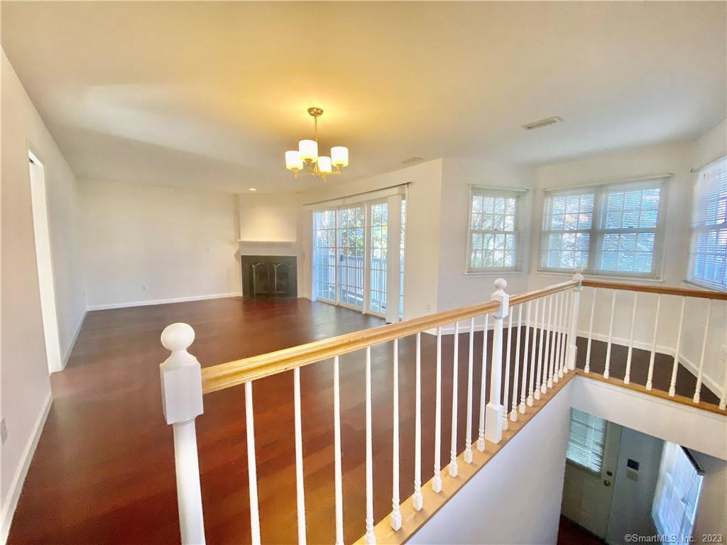 a view of a livingroom with furniture and window