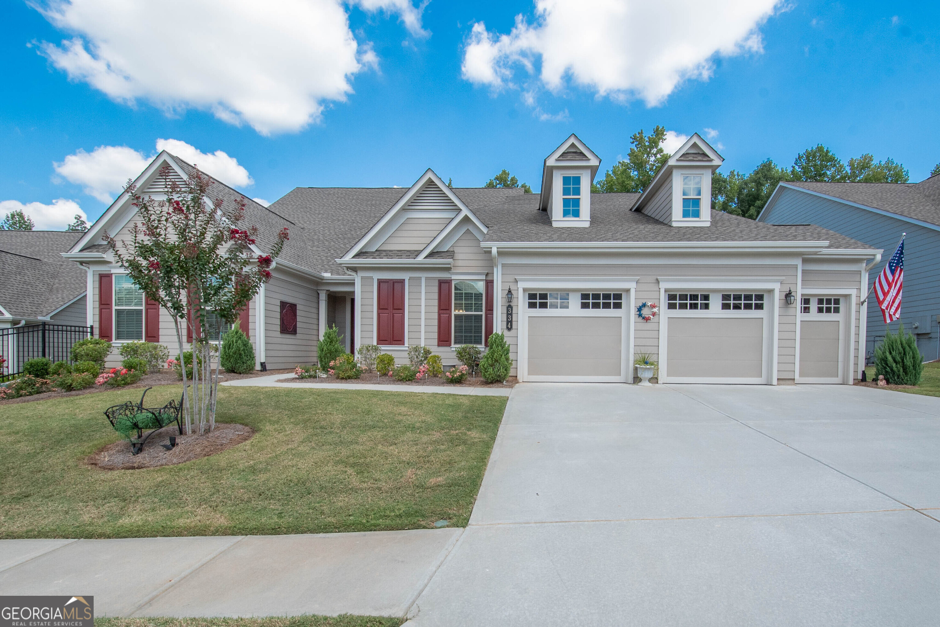 front view of a house with a yard