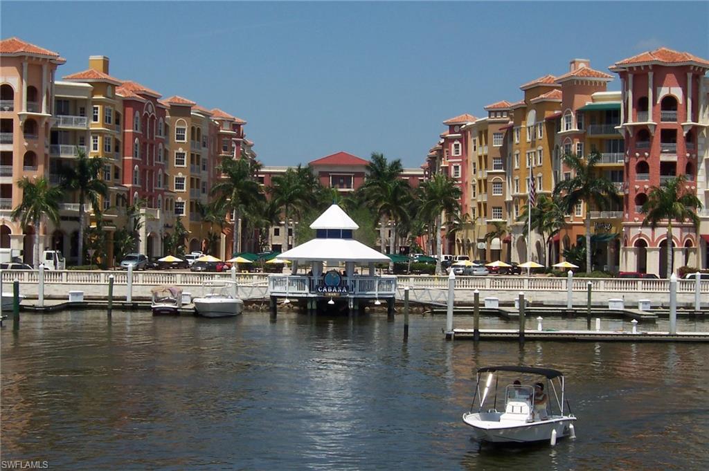 a view of water with building and lake view