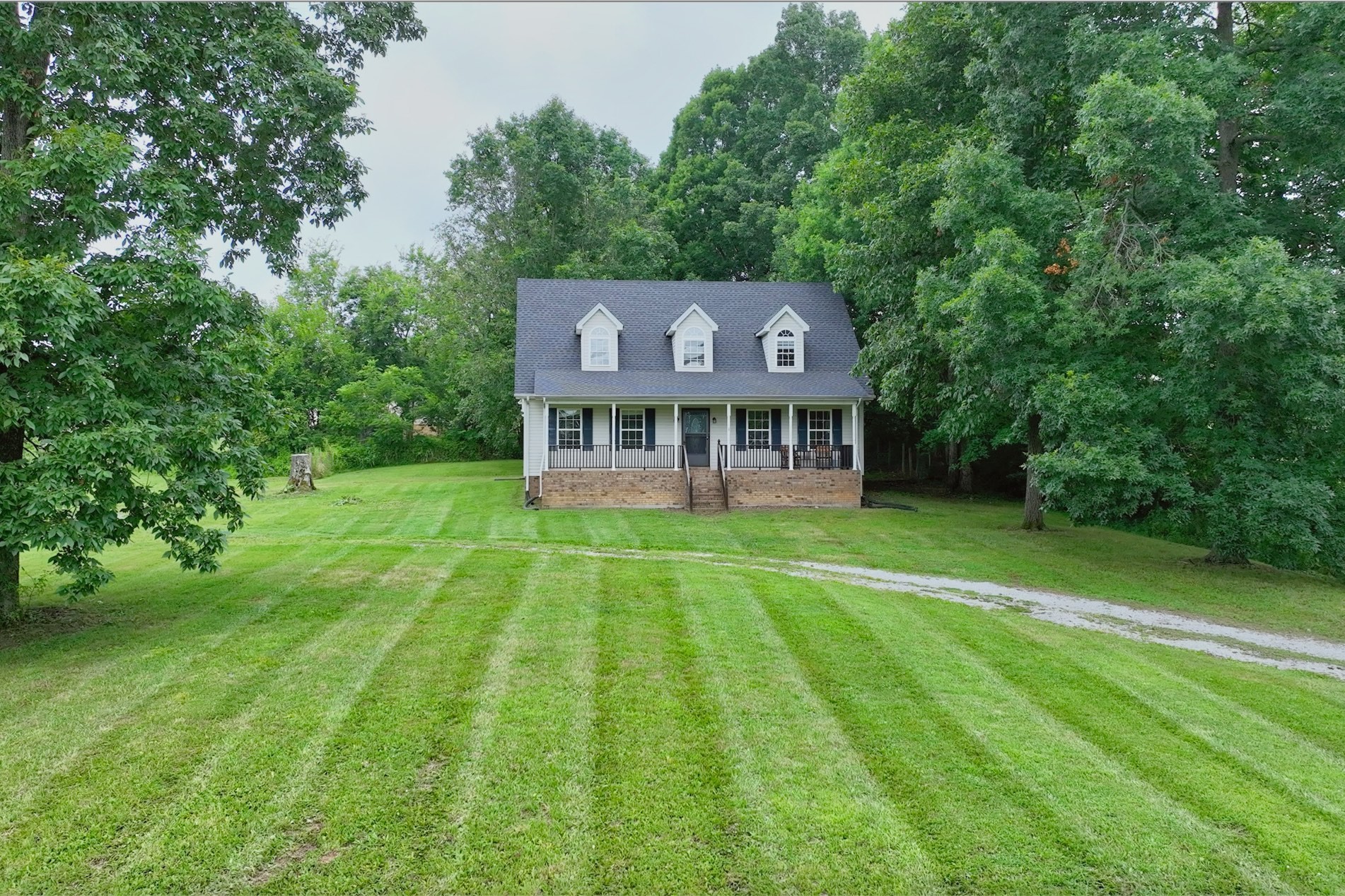 Welcome Home to 223 Lauren Ln!  Nice, two-story Country home with rocking chair front porch!