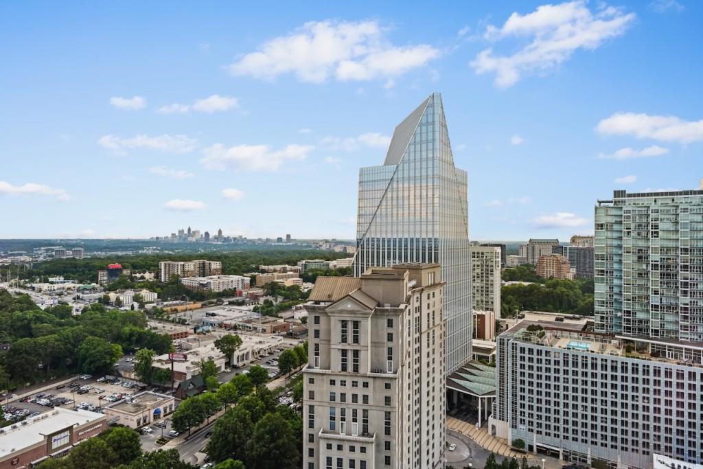 a view of city with tall buildings