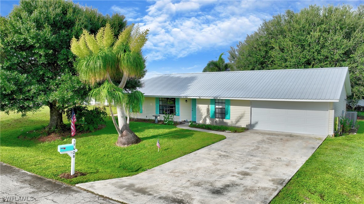 a view of a yard in front of a house