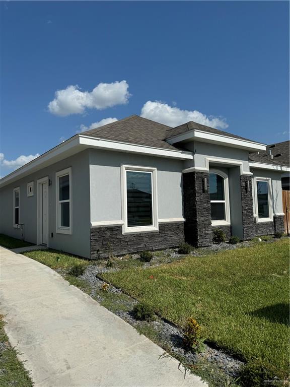 a front view of house with yard