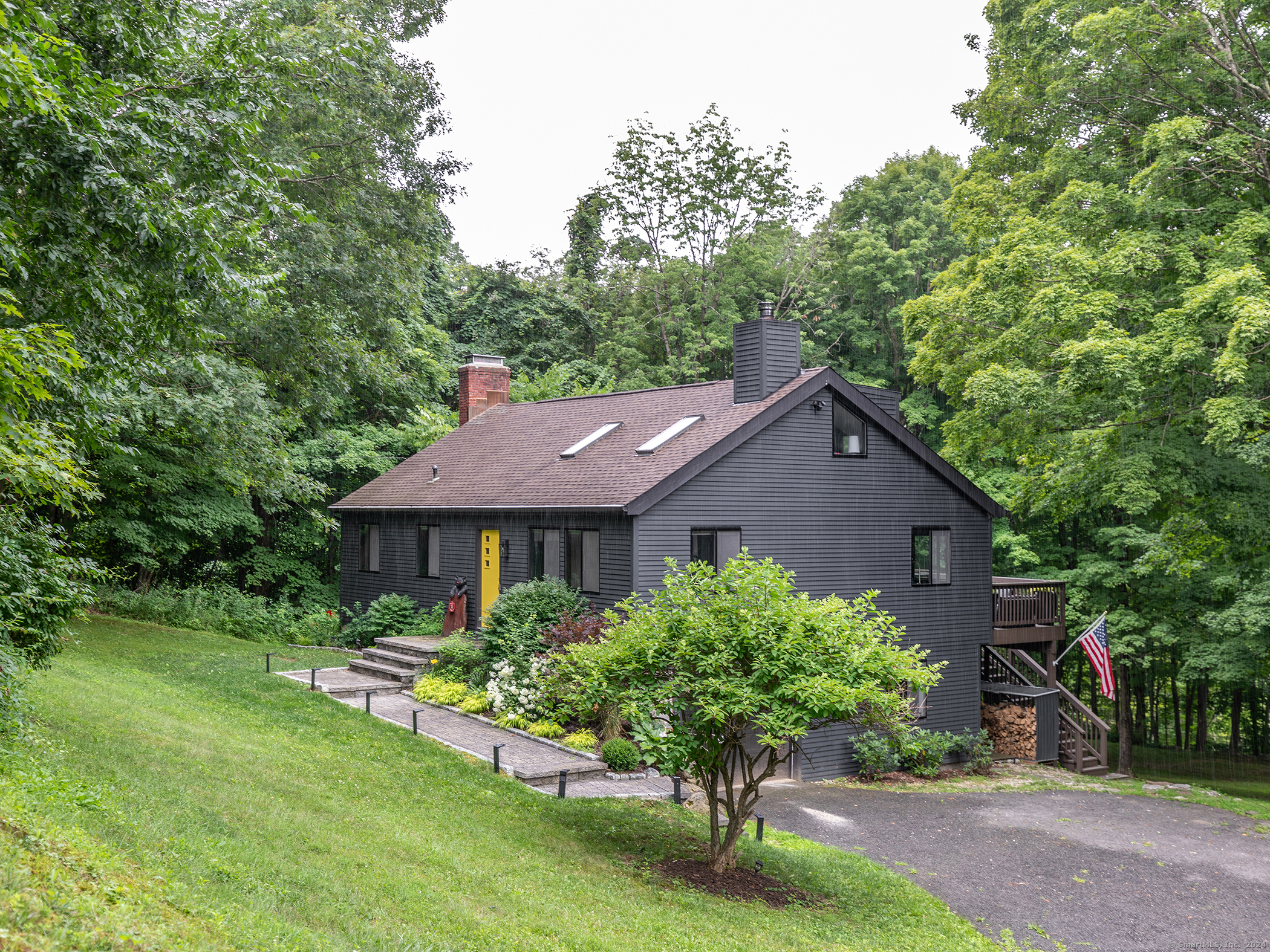 a house view with a garden space